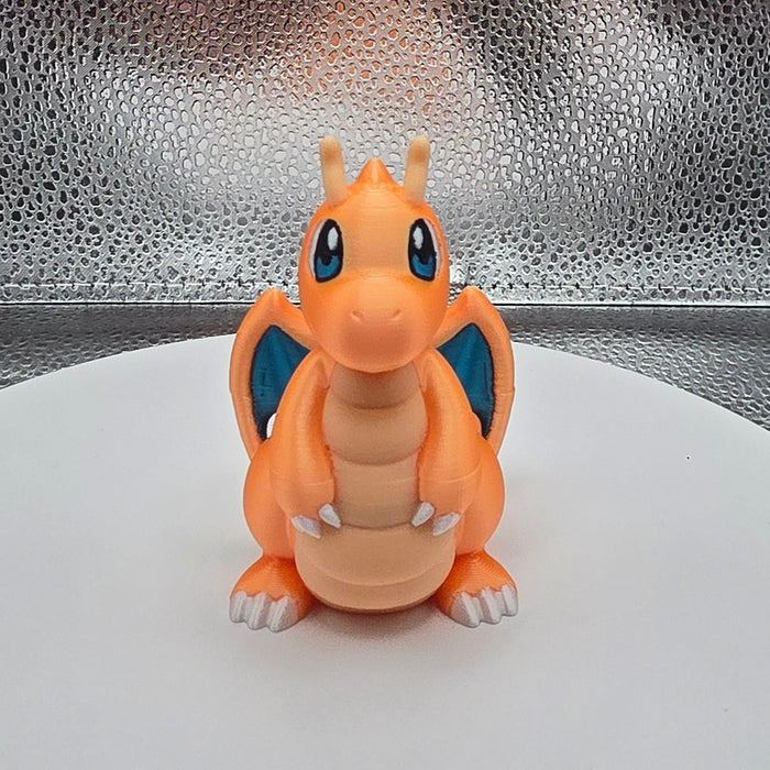 Small figurine of a cartoon character on a textured surface